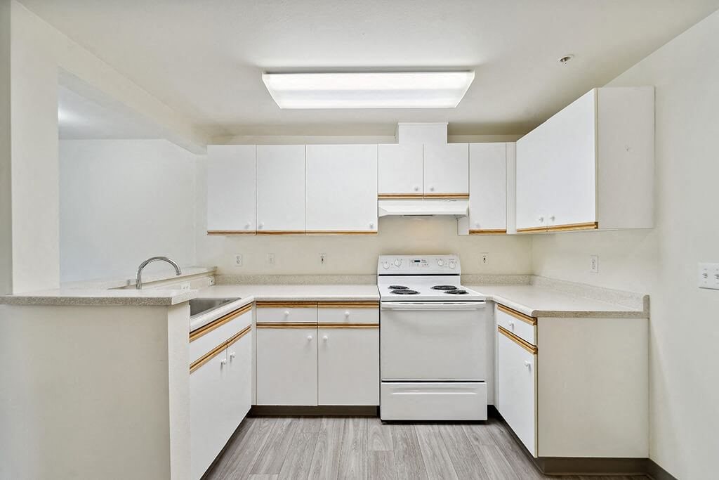 Kitchen cabinets at Woodlands at Forbes Lake Apartments in Kirkland WA